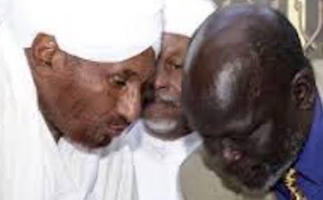 hoa-politicalscene.com/john-garang-to-sadiq-al-mahadi.html - John Garang to Sadiq al Mahadi: Sadiq al Mahadi whispering in John Garang's ear.