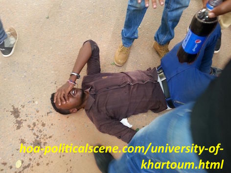 hoa-politicalscene.com/university-of-khartoum.html - University of Khartoum: Student down by security gas and students colleagues trying to help.